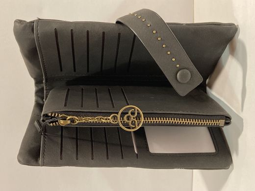 Monedero con repunteado triangulos Varis Black