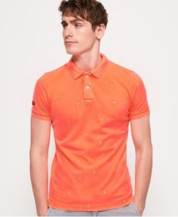 Polo básico piqué con flamencos bordados Superdry Washed Coral