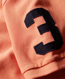 Polo m/c piqué con efecto delavado y letras branding bordadas Superdry Sun Orange