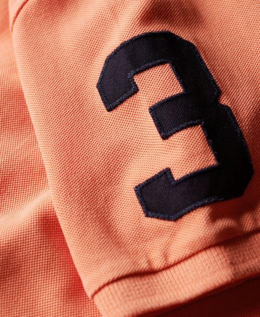 Polo m/c piqué con efecto delavado y letras branding bordadas Superdry Sun Orange